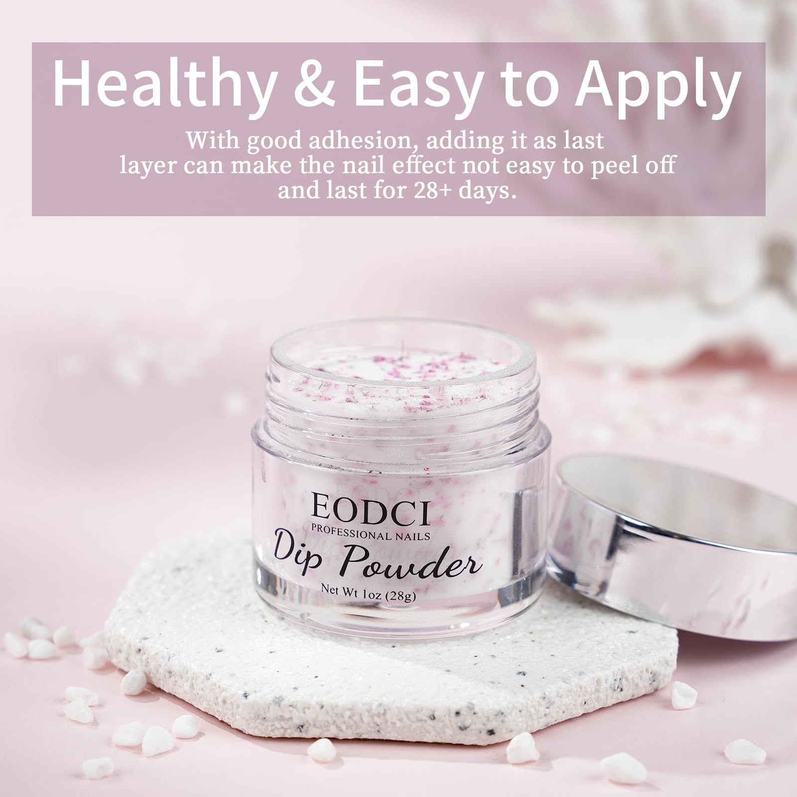Close up of Eodci pink shimmer nail dipping powder texture