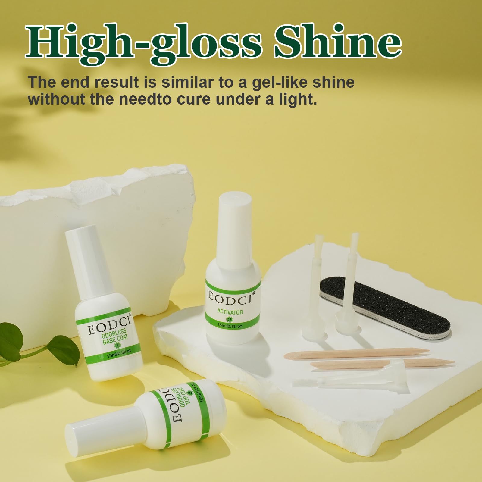 Eodci dipping powder base coat activator and top coat bottles arranged in a row