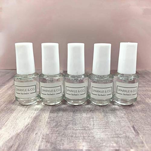 Five mini bottles of Sparkle & Co. Number 4 Glossy Coat top sealant for shiny dip nails.