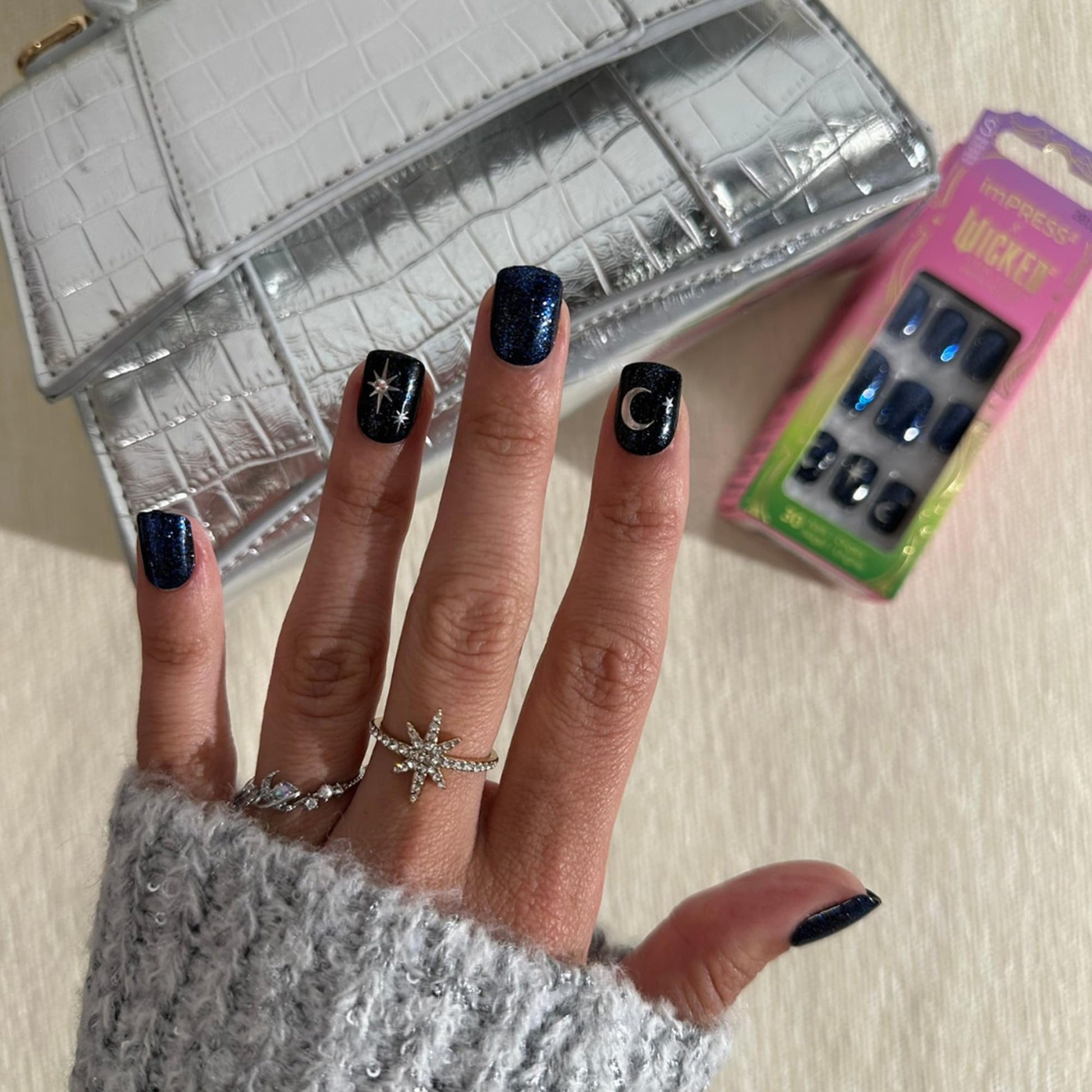 Lifestyle view of finished manicure with Know Your Power nails