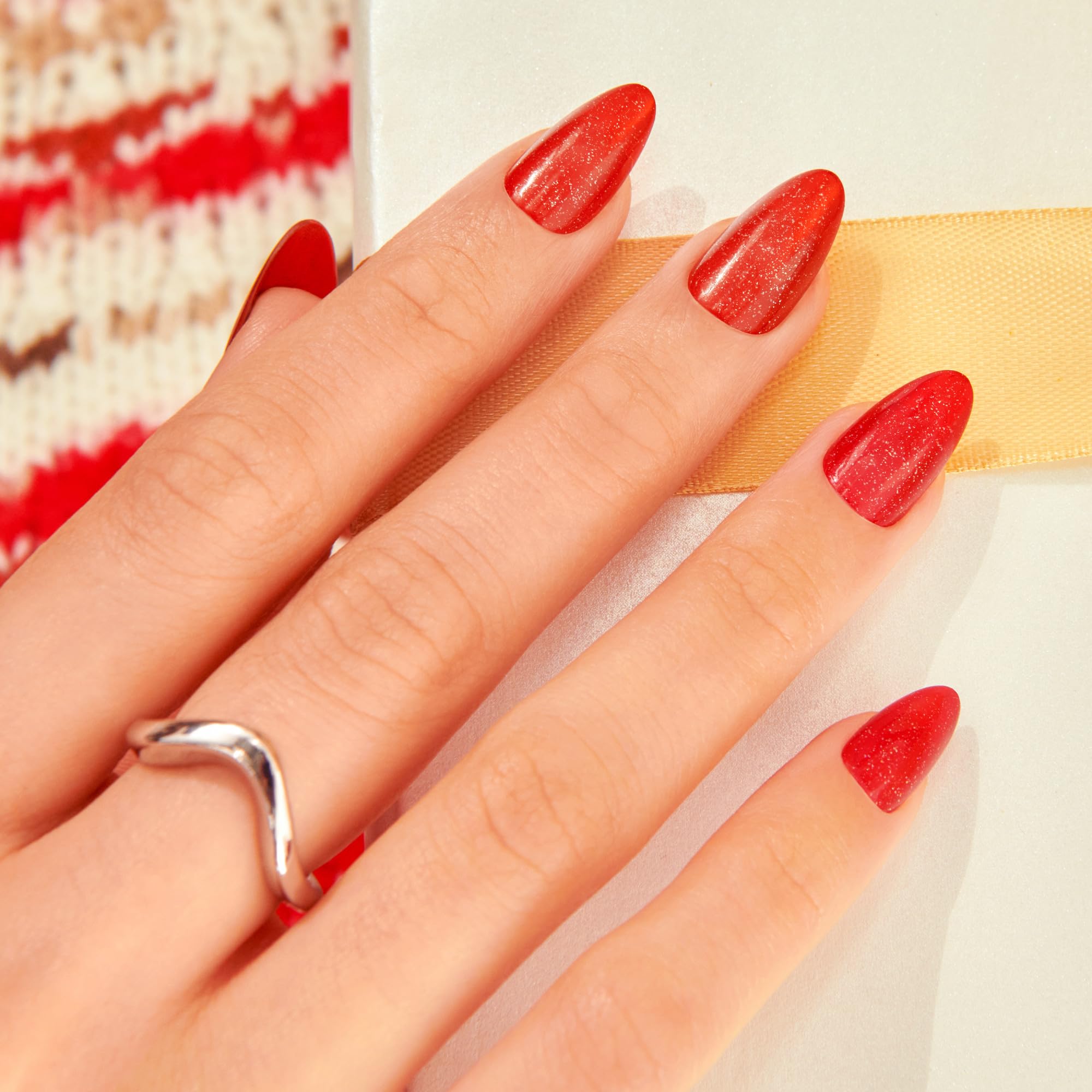 Close up of magnetic red finish on Kiss Voguish Fantasy nails