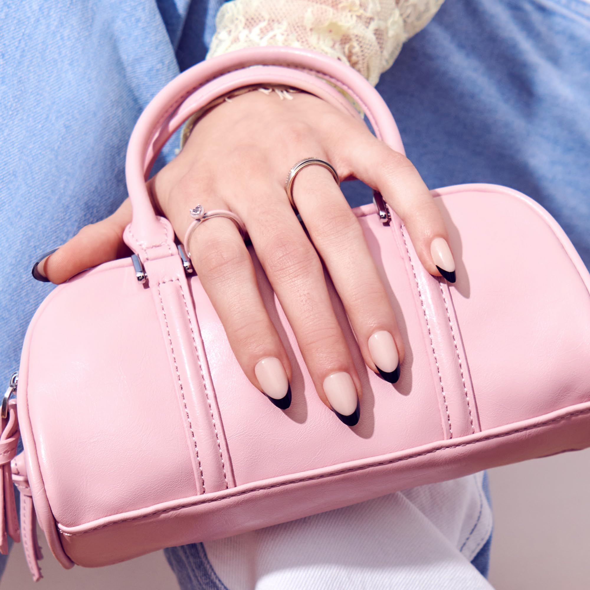 Side profile of short coffin shaped black press on nails
