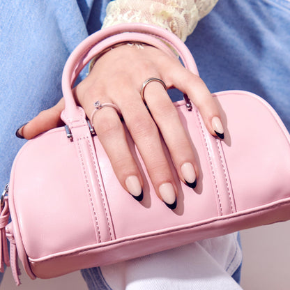 Side profile of short coffin shaped black press on nails