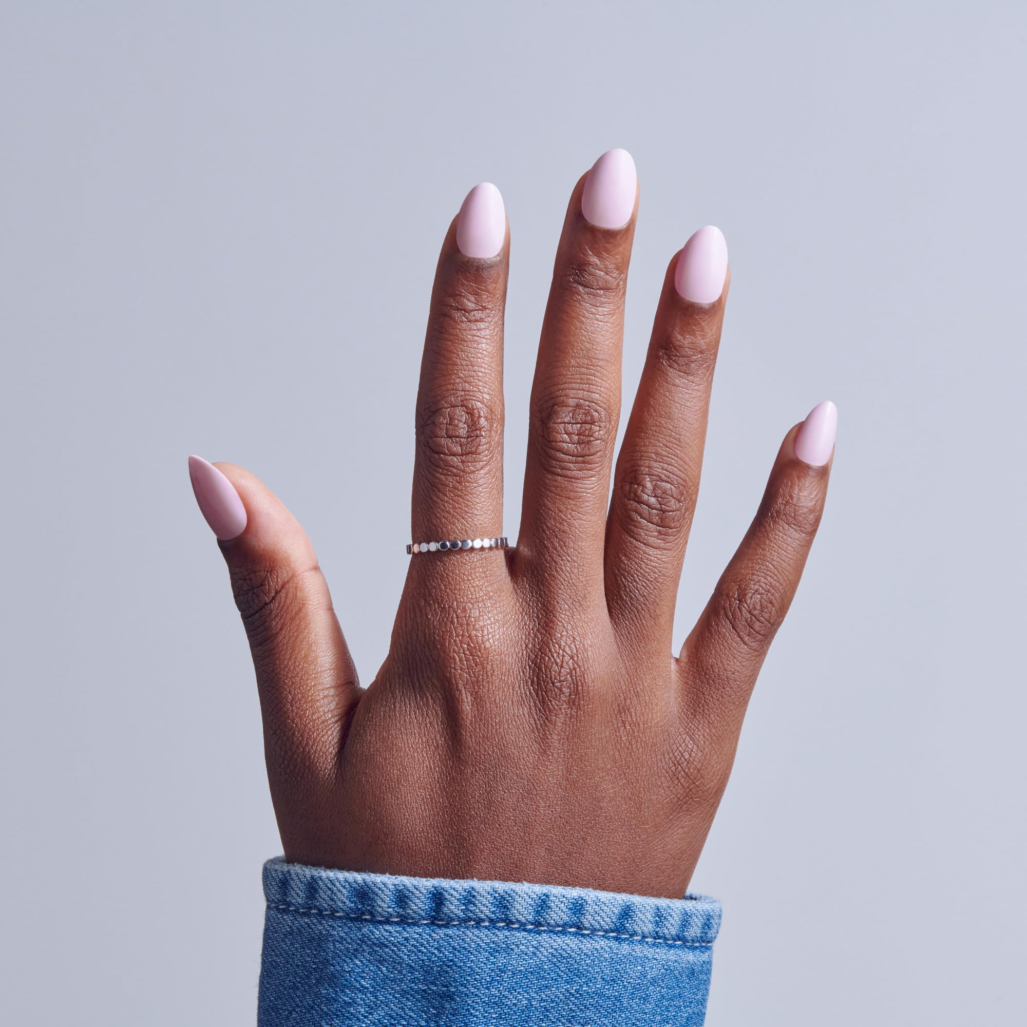 Close up of Kiss Core press on nails pink almond shape
