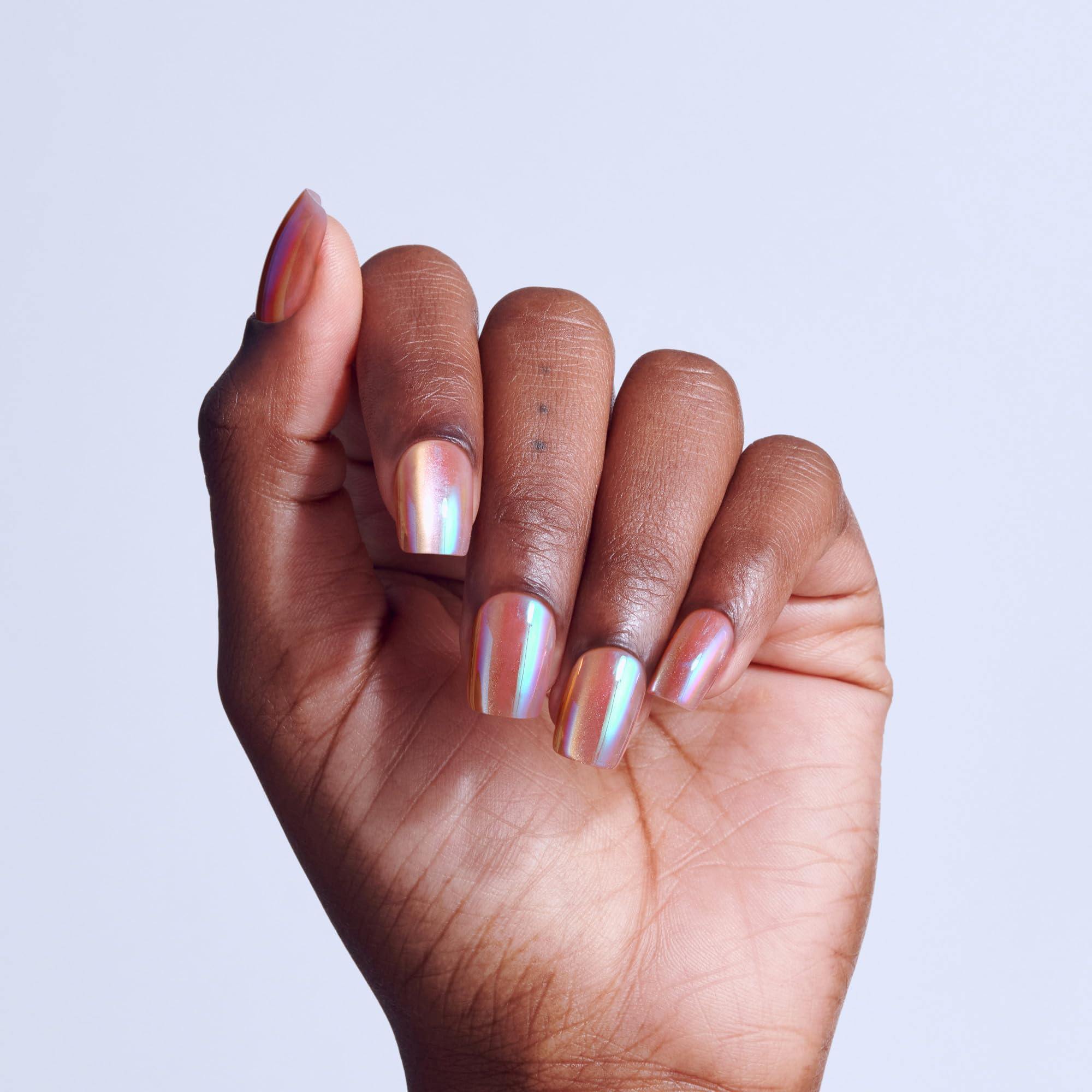 Close up of short squoval shaped pink magnetic press on nails