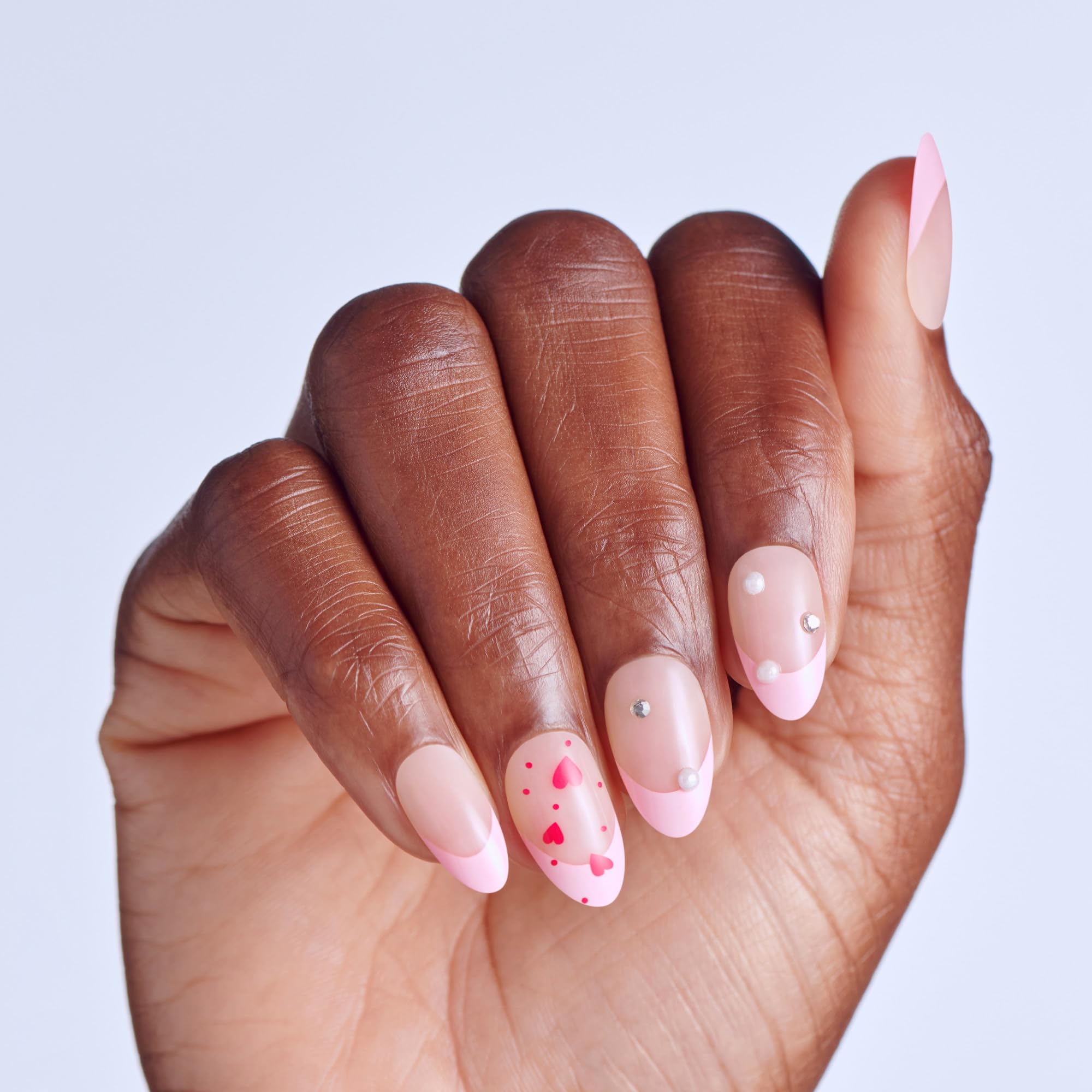 Kiss Impress press on nails packaging showing medium almond design