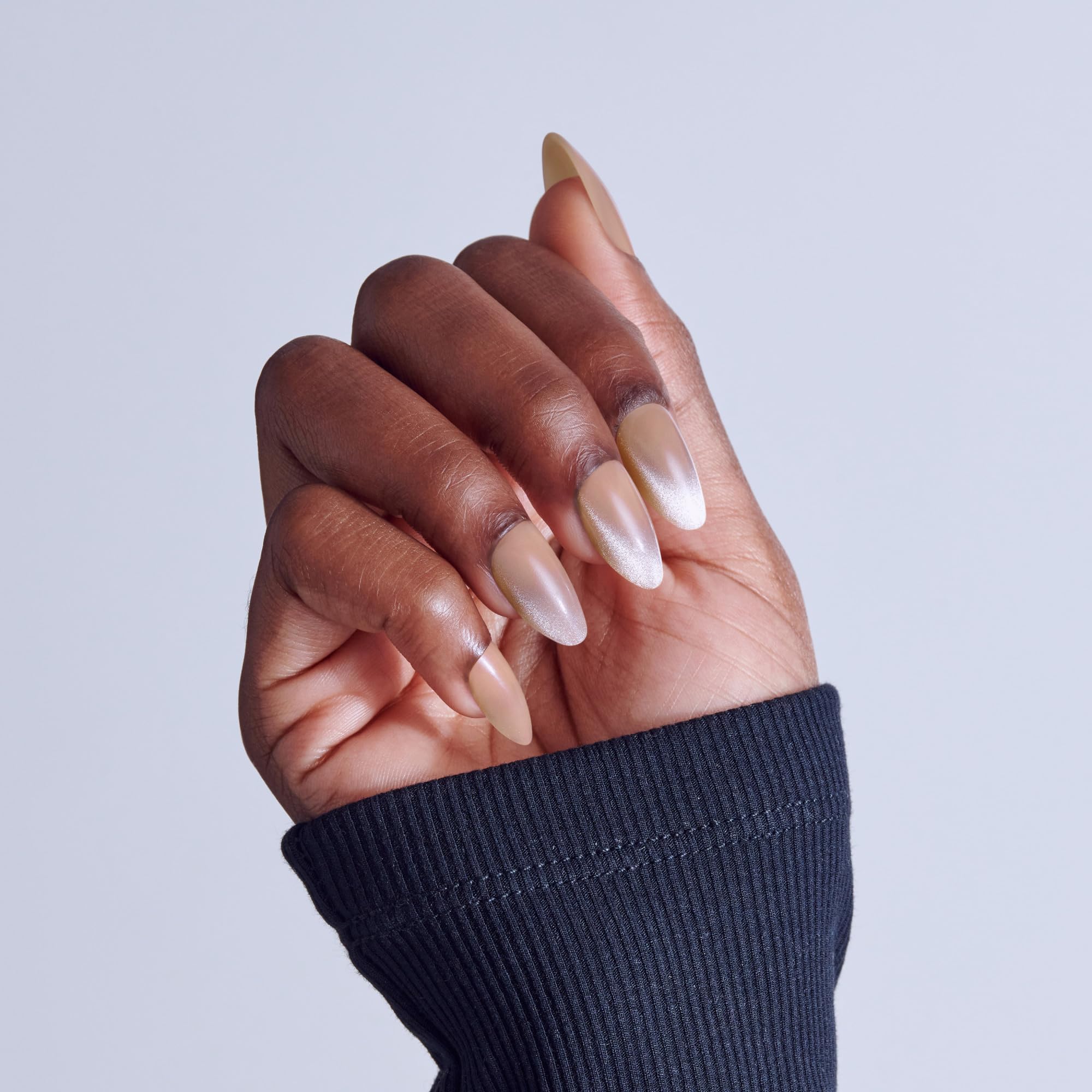 Close up of beige shimmer magnetic nail texture