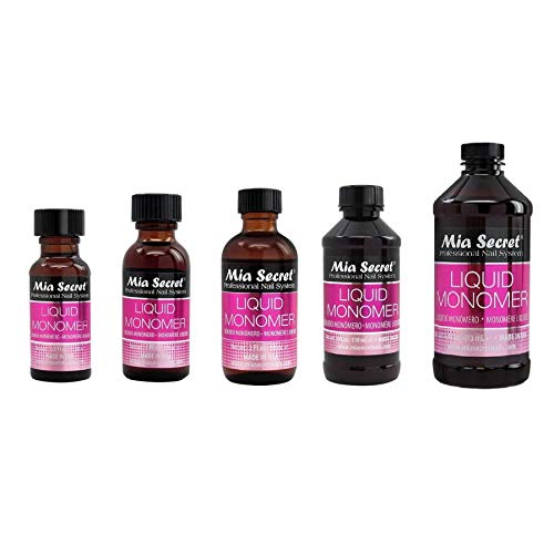 Mia Secret professional acrylic system bottle displayed alongside salon tools emphasizing imported nail technician quality.