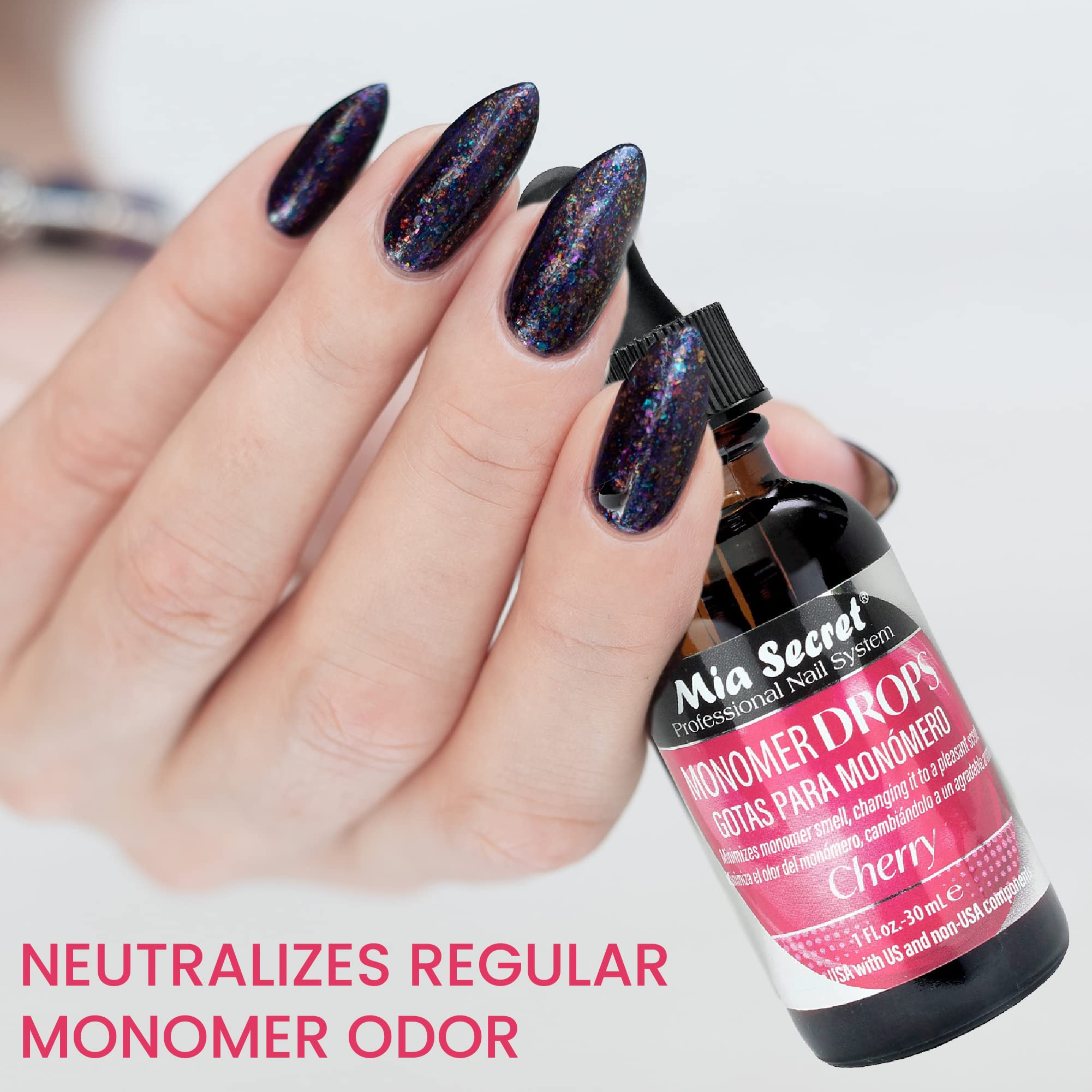 Professional nail salon setting showing liquid monomer additive for odor control