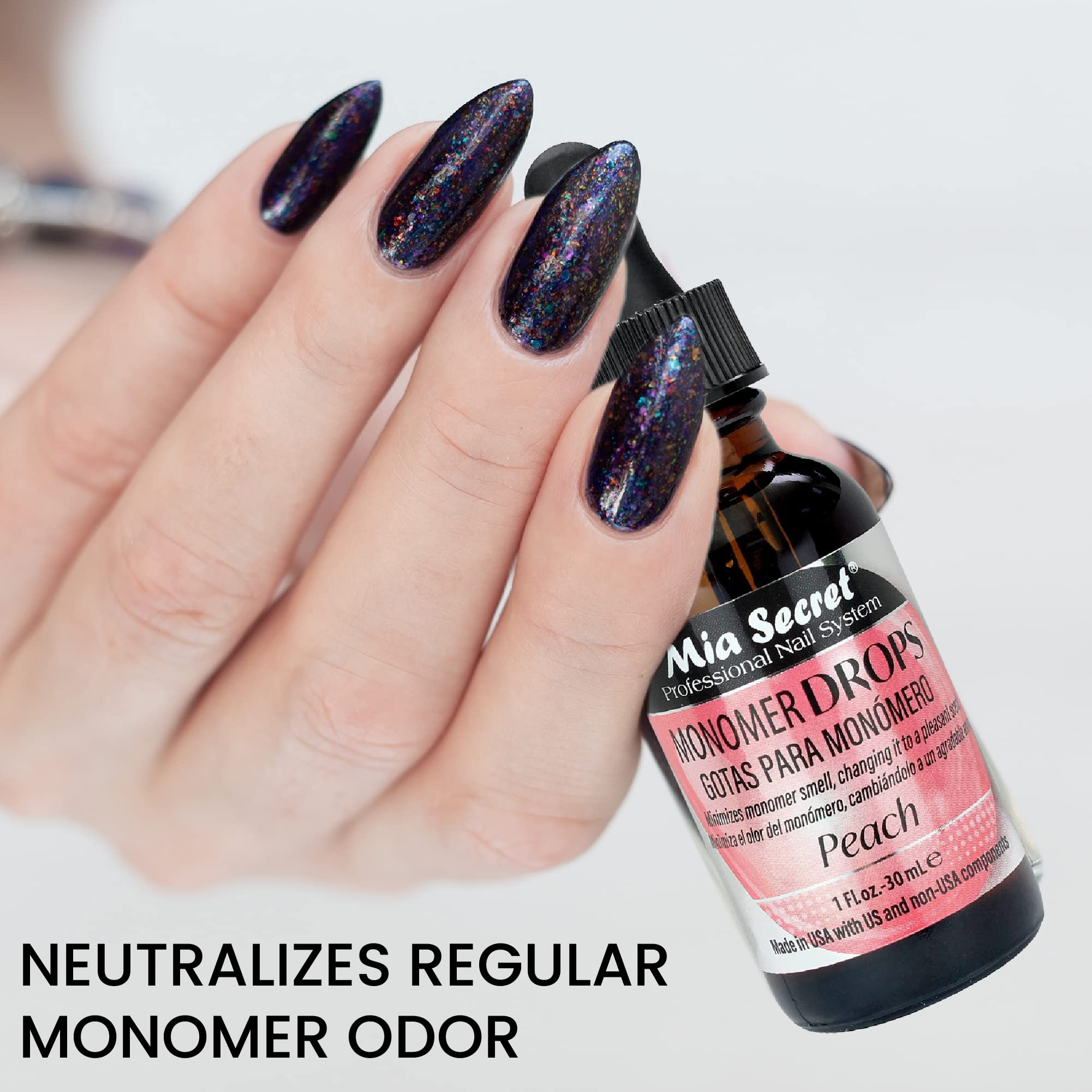 Close up of liquid monomer odor neutralizer bottle by Mia Secret