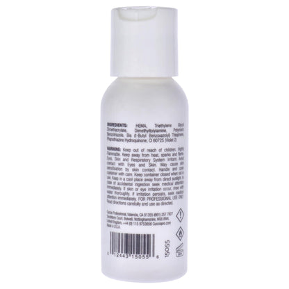 Two Ounce bottle of Cuccio Pro salon monomer showing clear liquid formulation details
