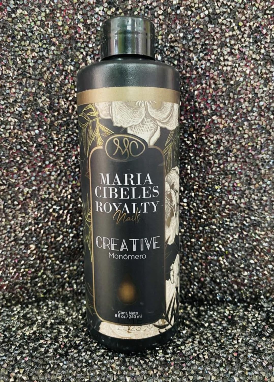 Full product presentation of the MC Nails Maria Cibeles 8 Ounce liquid monomer bottle highlighting its professional salon-quality design.
