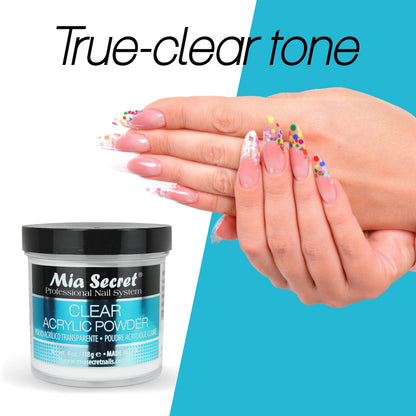 Manicure setup featuring the four ounce clear acrylic powder container next to a dappen dish