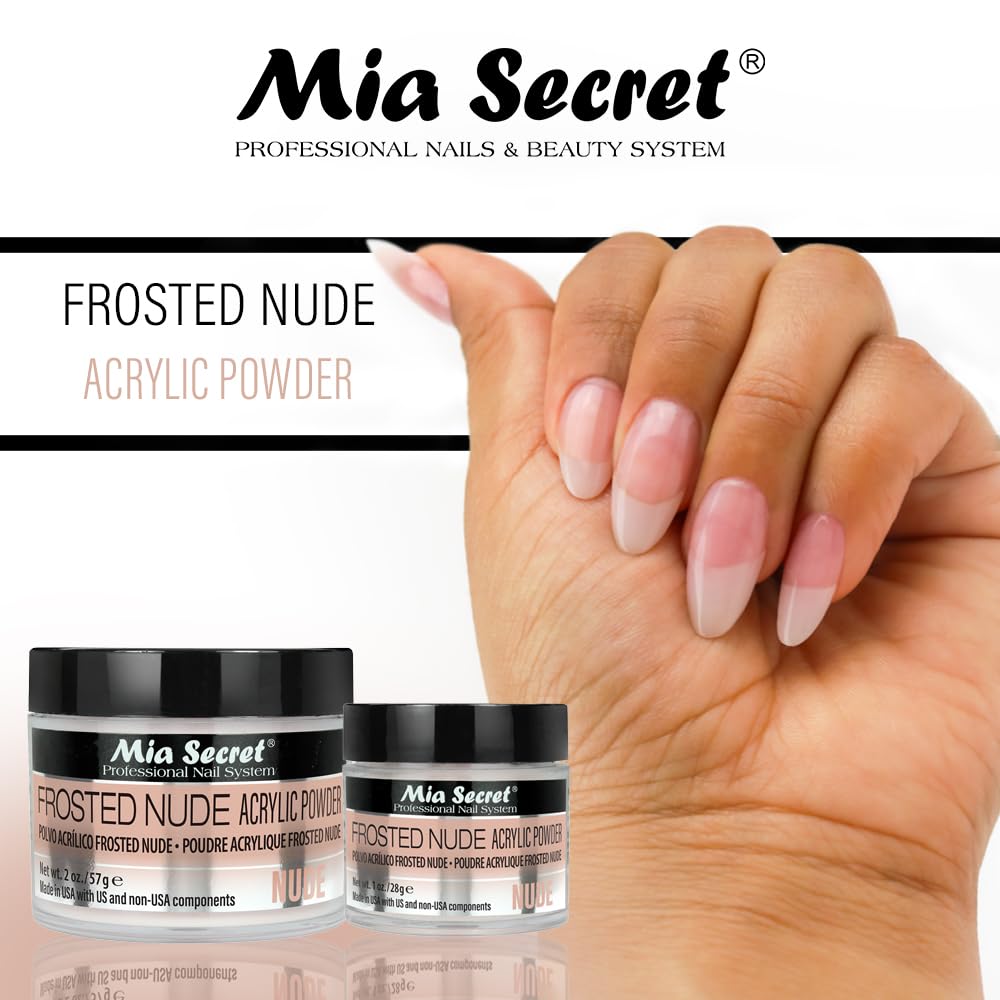 Professional nail technician applying Frosted Nude acrylic