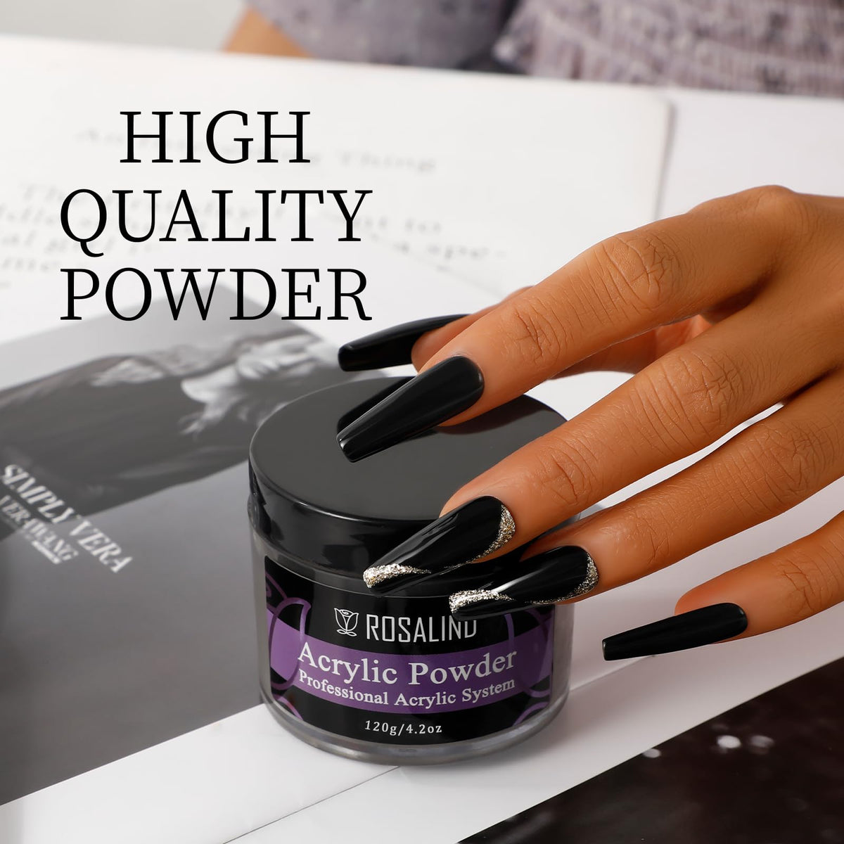 Air-cured black acrylic nail extensions showing glossy finish and durability