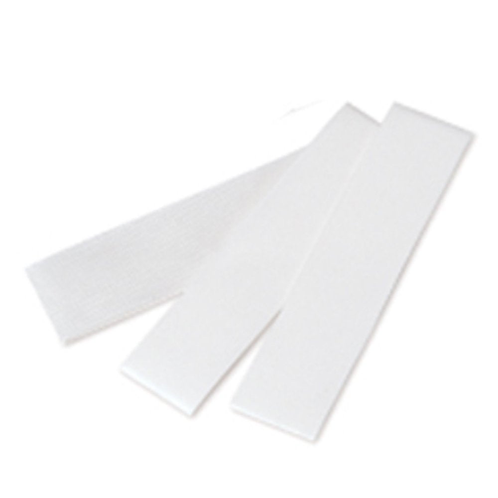 Close up of self adhesive white fiberglass strip for natural nail repair.