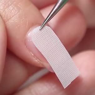 Clear invisible finish of Sheba Nails wrap after saturation with nail resin.