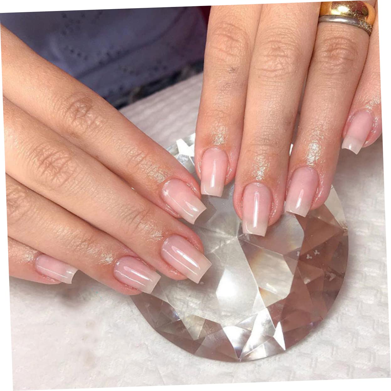 Close up of transparent fiberglass nail wrap strips