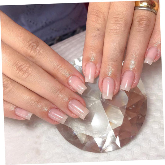 Close up of transparent fiberglass nail wrap strips