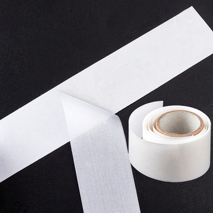 Fiberglass silk nail wrap being applied to a fingernail