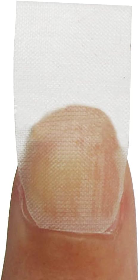 Applying fiberglass nail wrap for UV gel nail extension