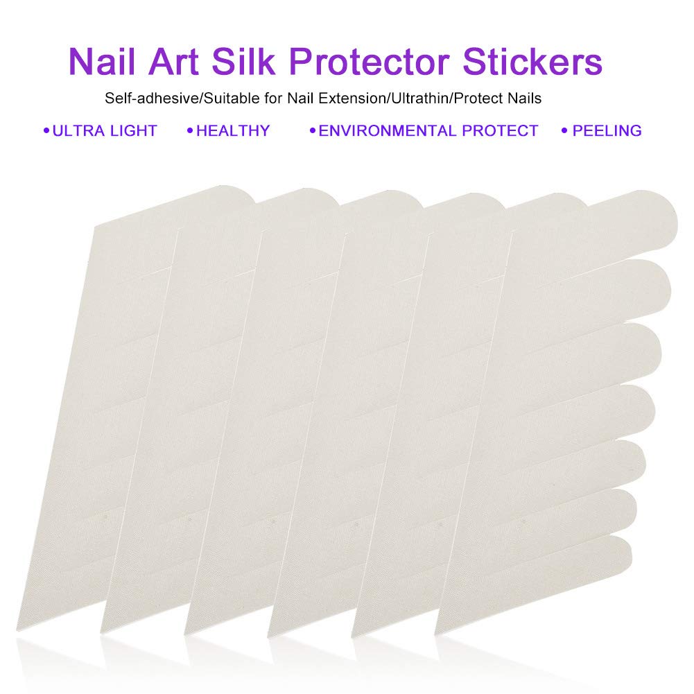 Manicure technician trimming a transparent silk wrap to fit a natural nail shape