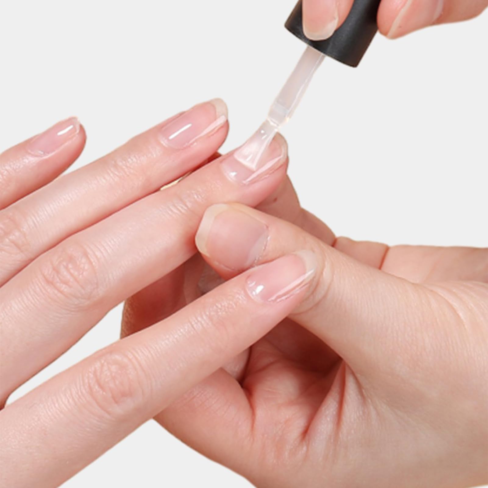 Application of fiberglass fiber onto a natural nail