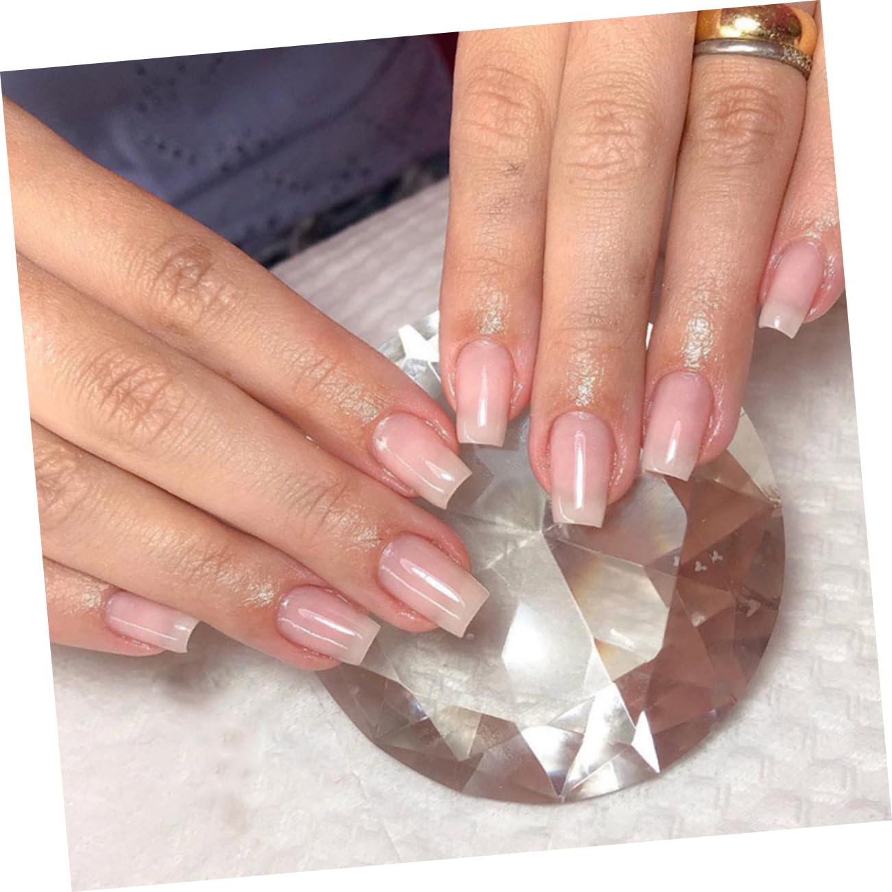 Professional nail technician applying Mipcase fiber wraps