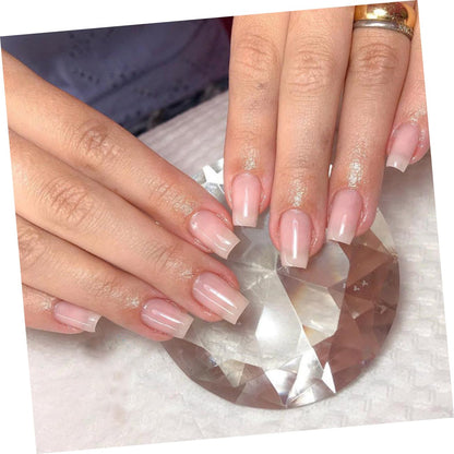 Professional nail technician applying Mipcase fiber wraps