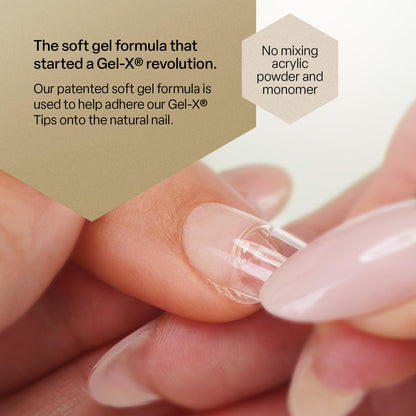 Close up of AprÃ©s Extend Gel bottle brush applicator