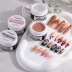 Pearly white and pink shades of Fcozpjk solid builder gel under lighting