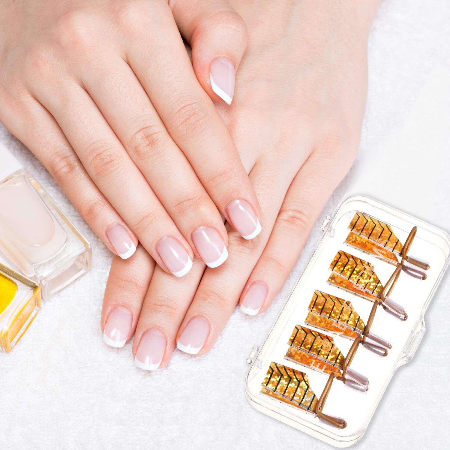 Hand wearing professional acrylic nail extension protector