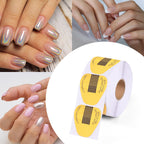 Completed nail extensions built on gold horseshoe paper templates