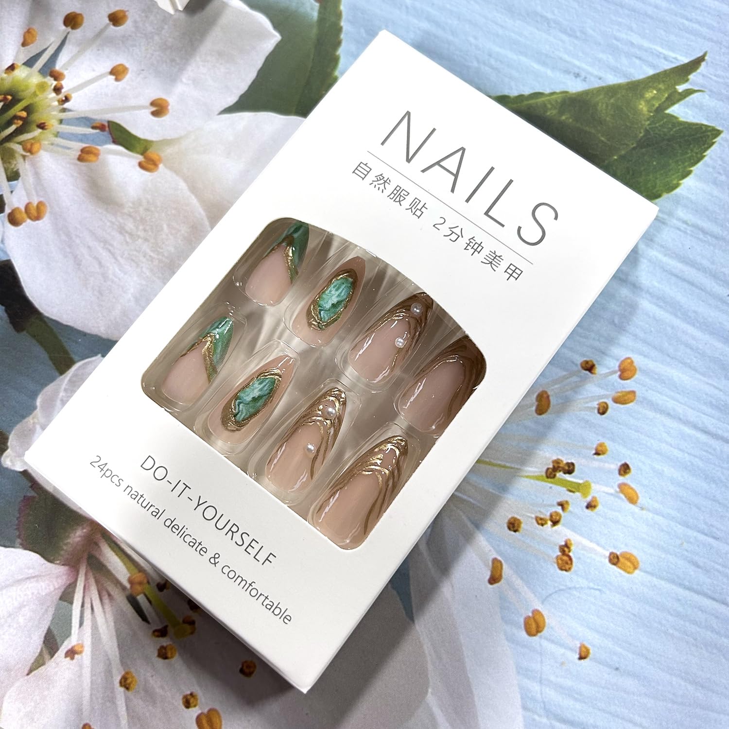 Hand model wearing ASABITE medium length press on nails