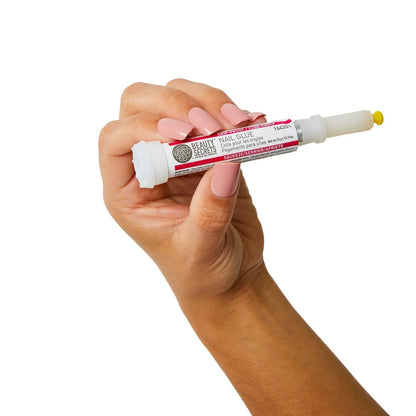 Professional nail repair using Beauty Secrets adhesive