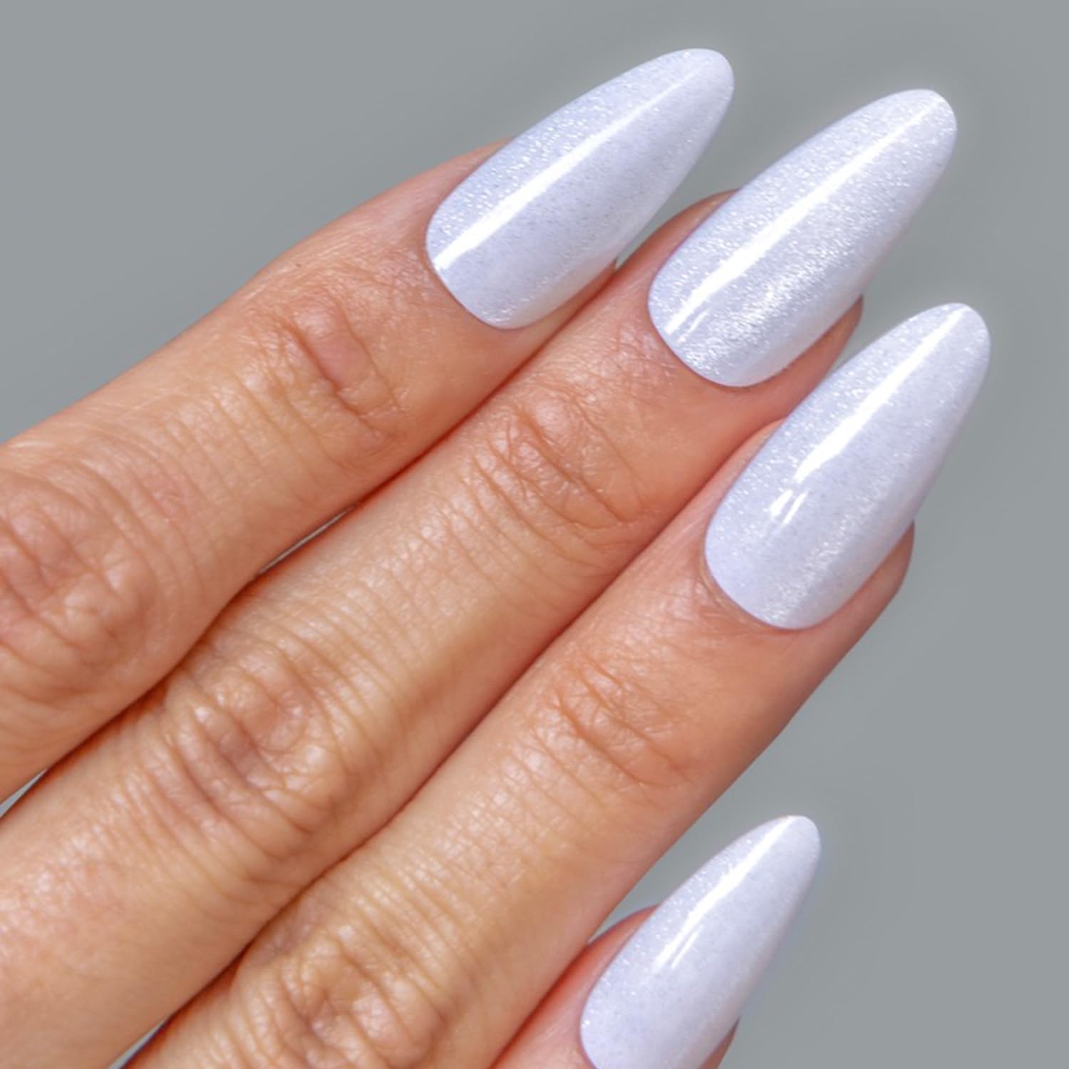 Close up view of Cala quick dry nail glue bottle