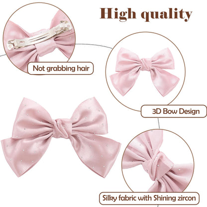 Model demonstrating a half-up hairstyle using the large black satin ribbon bow clip.