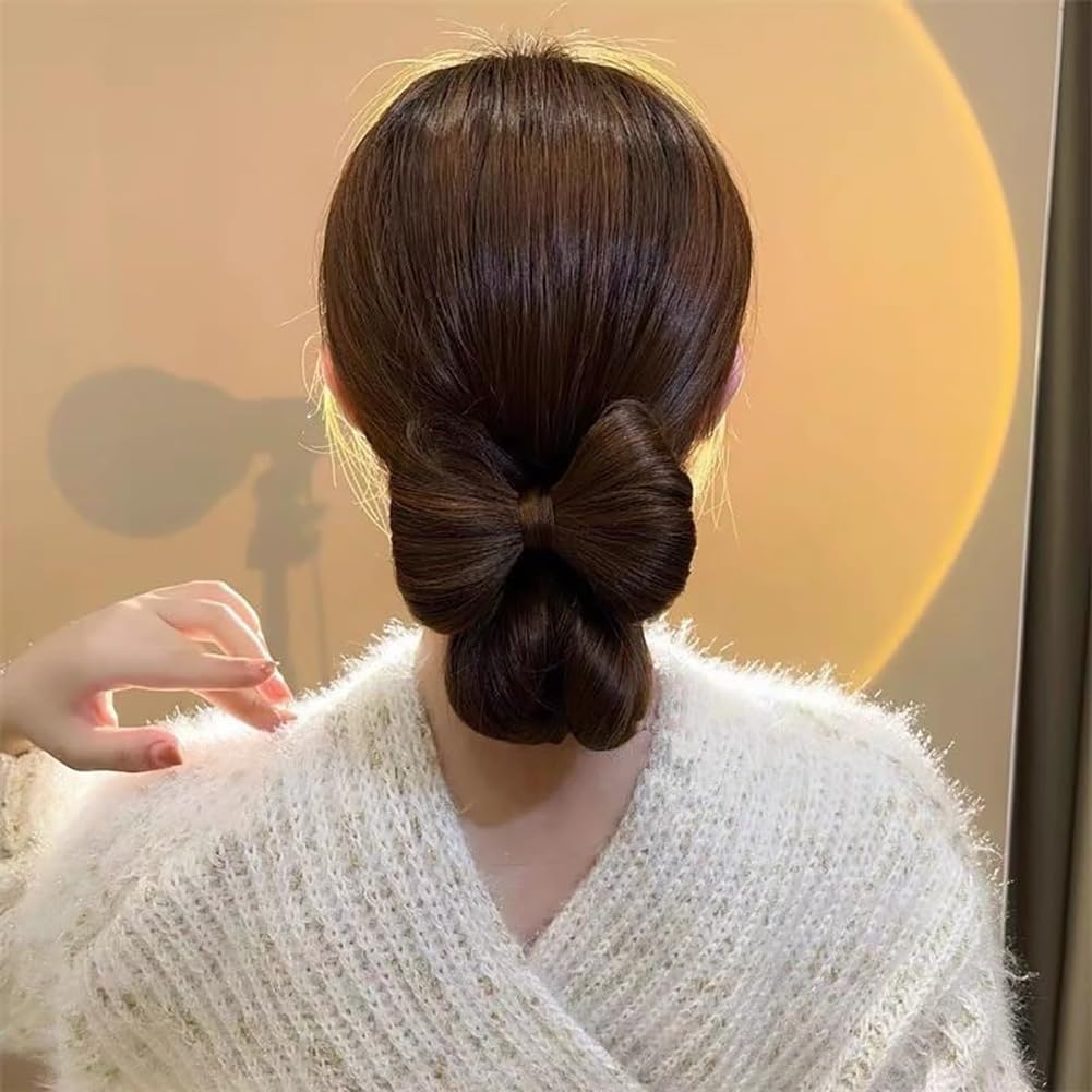 Synthetic hairpiece extensions close up showing matte fiber texture and clips