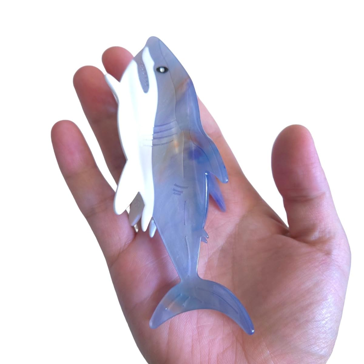 OMG Decor shark hair accessory displaying the strong inner metal spring mechanism and non slip grip construction.