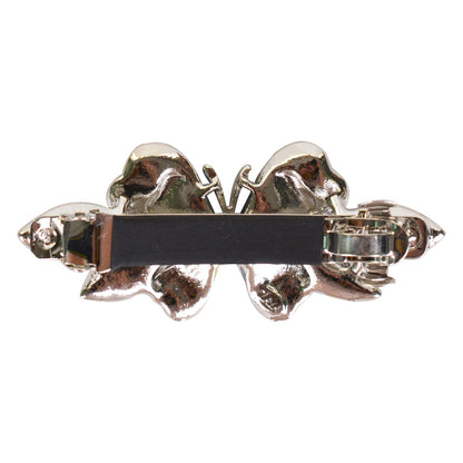 Sankuwen purple rhinestone hair barrette positioned to show the shimmering side profile