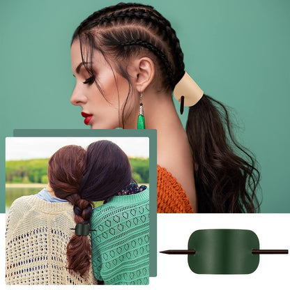 Four different colors of the elegant oval faux leather hair accessories arranged together