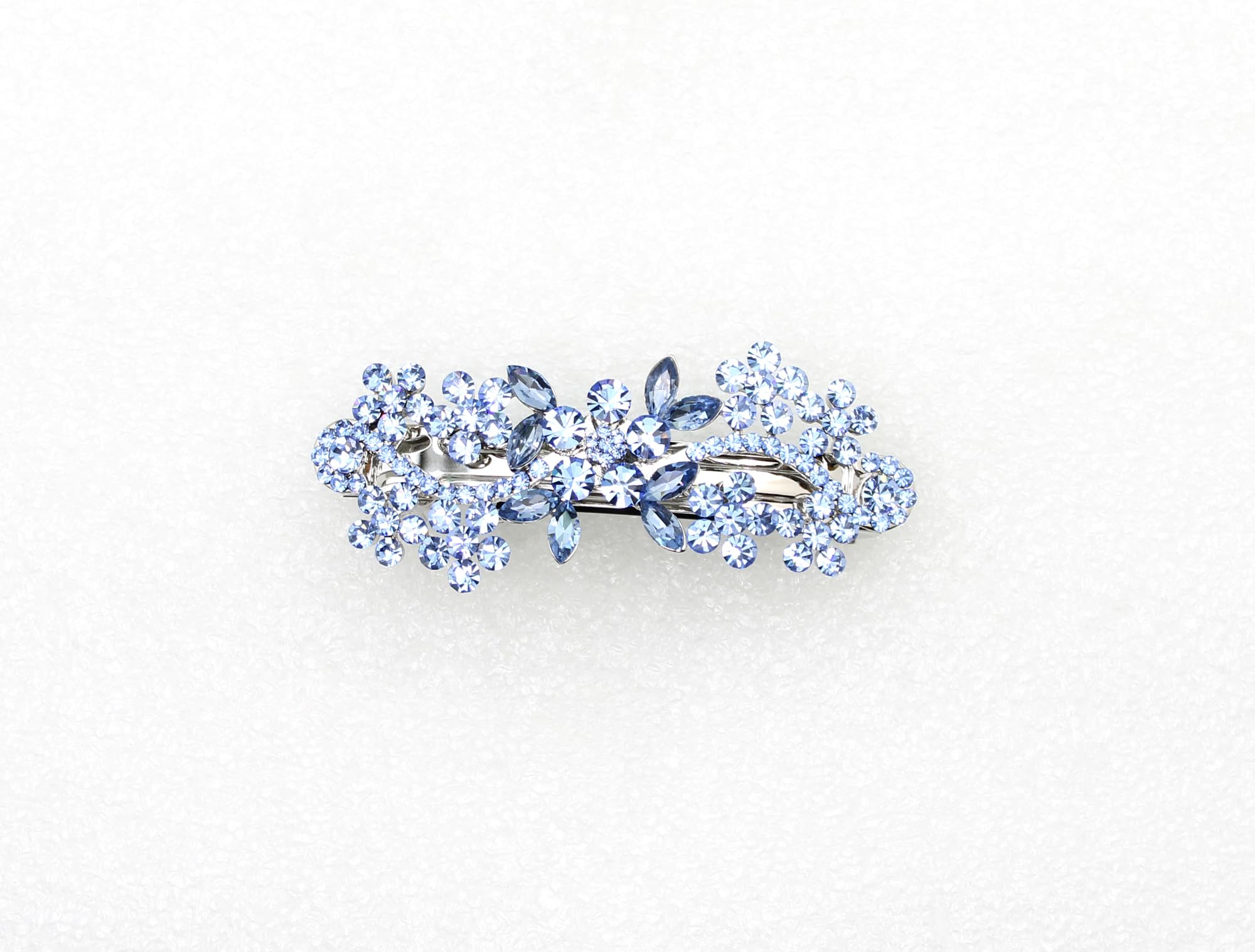 Luxury floral crystal hair accessory in silver tone metal setting showcasing shimmering rhinestones