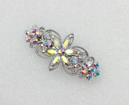 Faship premium rhinestone crystal flower barrette displaying the multi-angle color shifts of the AB finish.