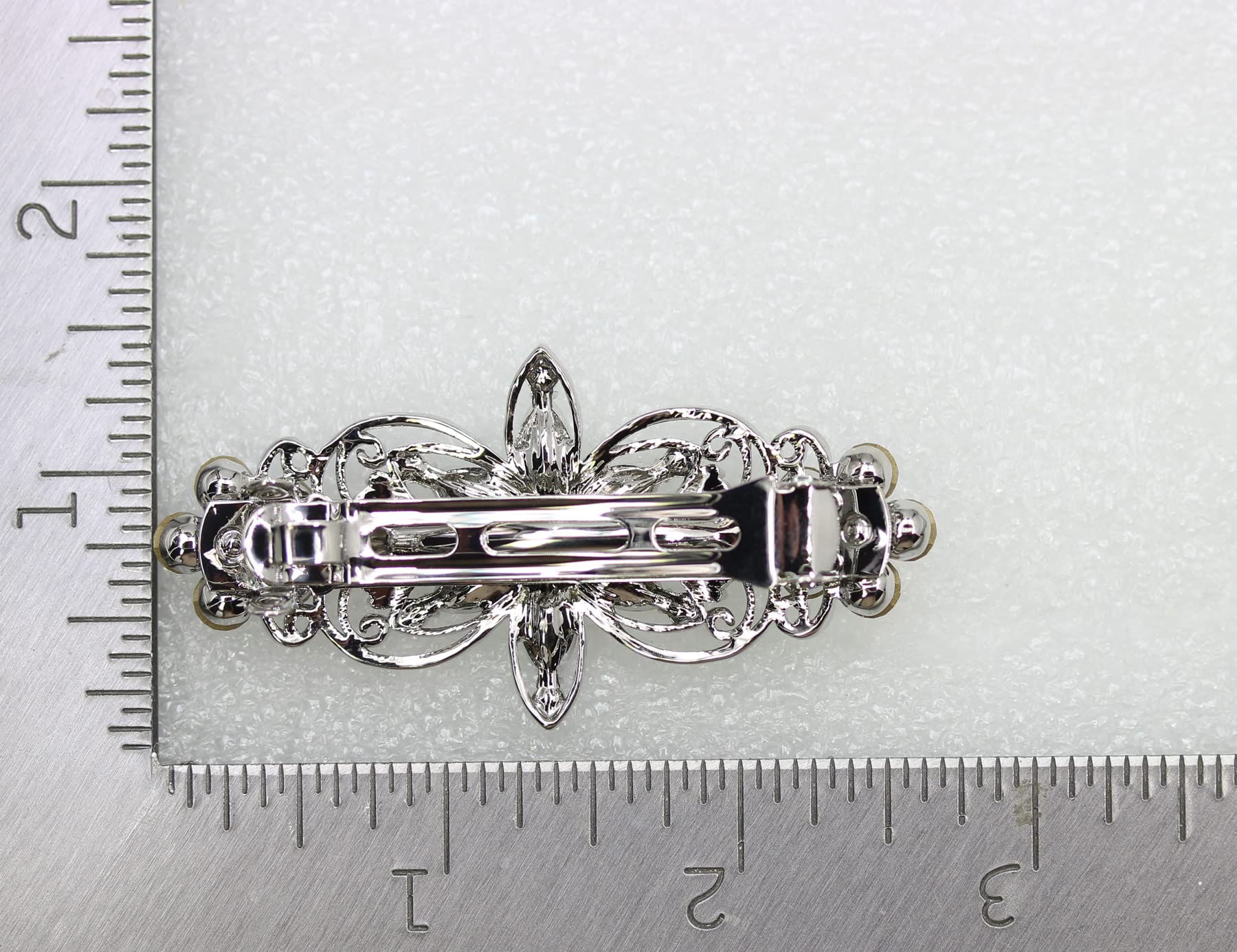 Faship gorgeous floral themed rhinestone hair accessory highlighting the intricate marquise crystal placement.