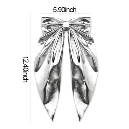 ShiQiao Spl large silver bowknot clip with long ribbon tails styled in a half-up ponytail.