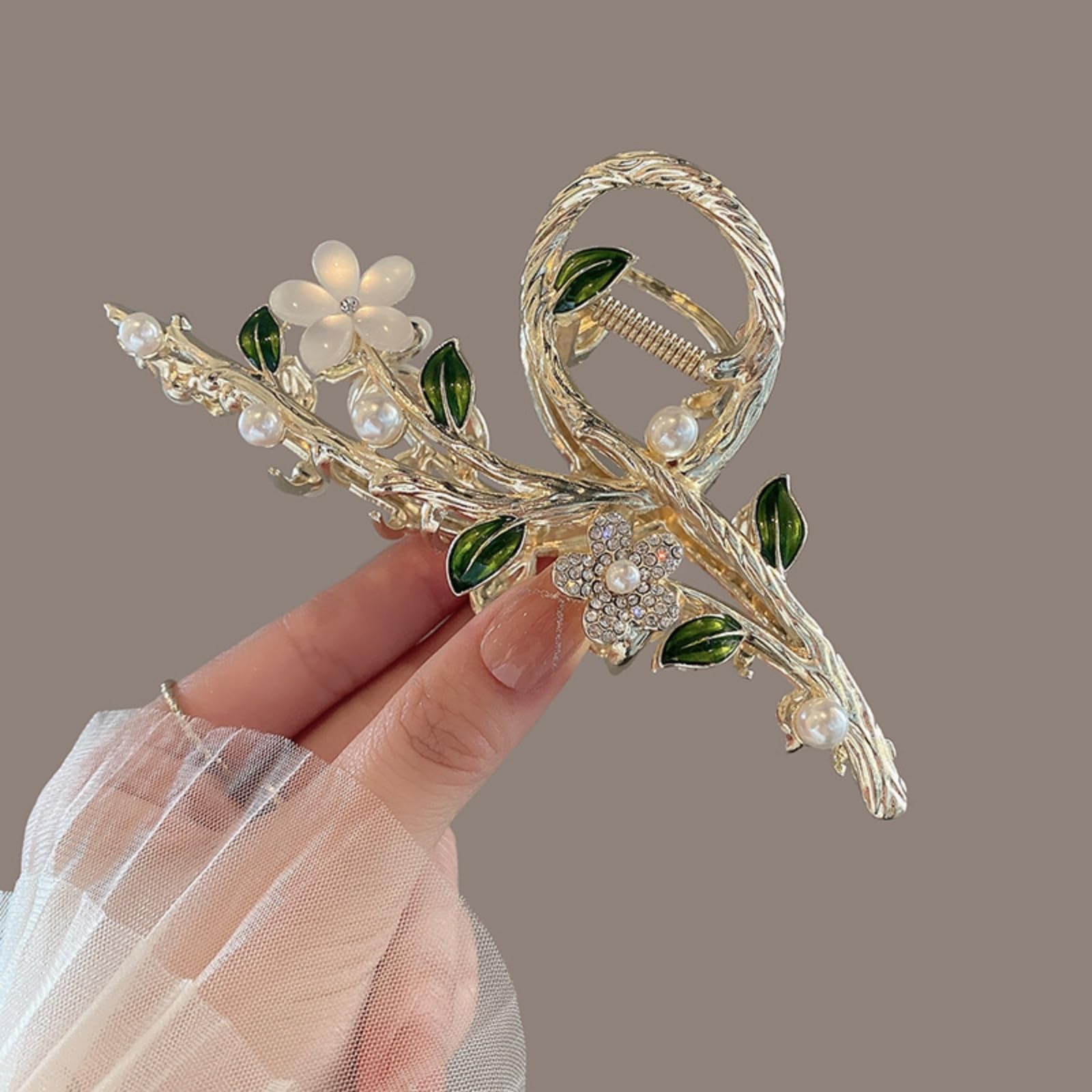 Elegant gold metal flower hair grab clip with faux pearl details