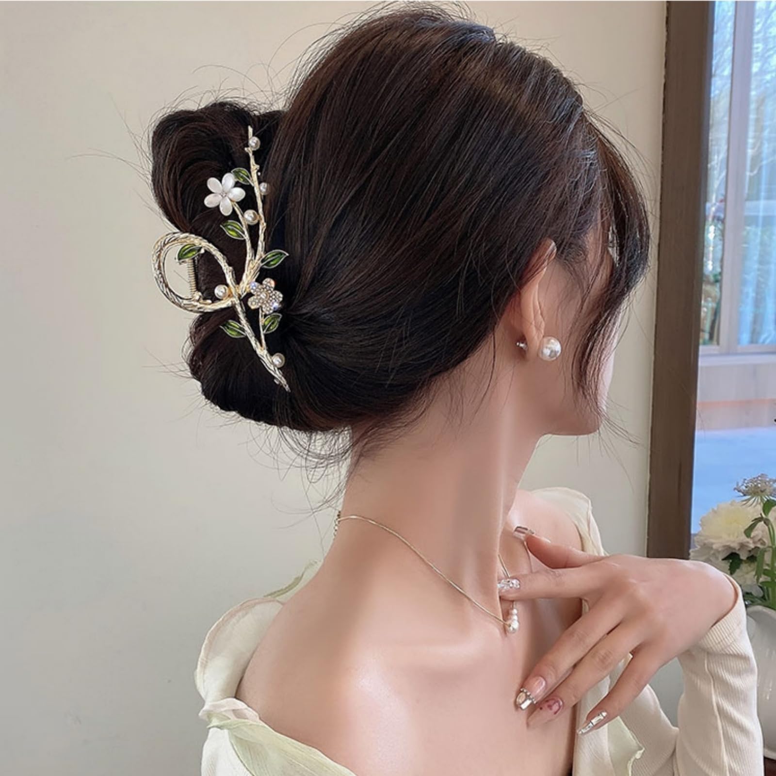 Oh Soo Pink luxury hair accessory showing intricate cat eye floral patterns