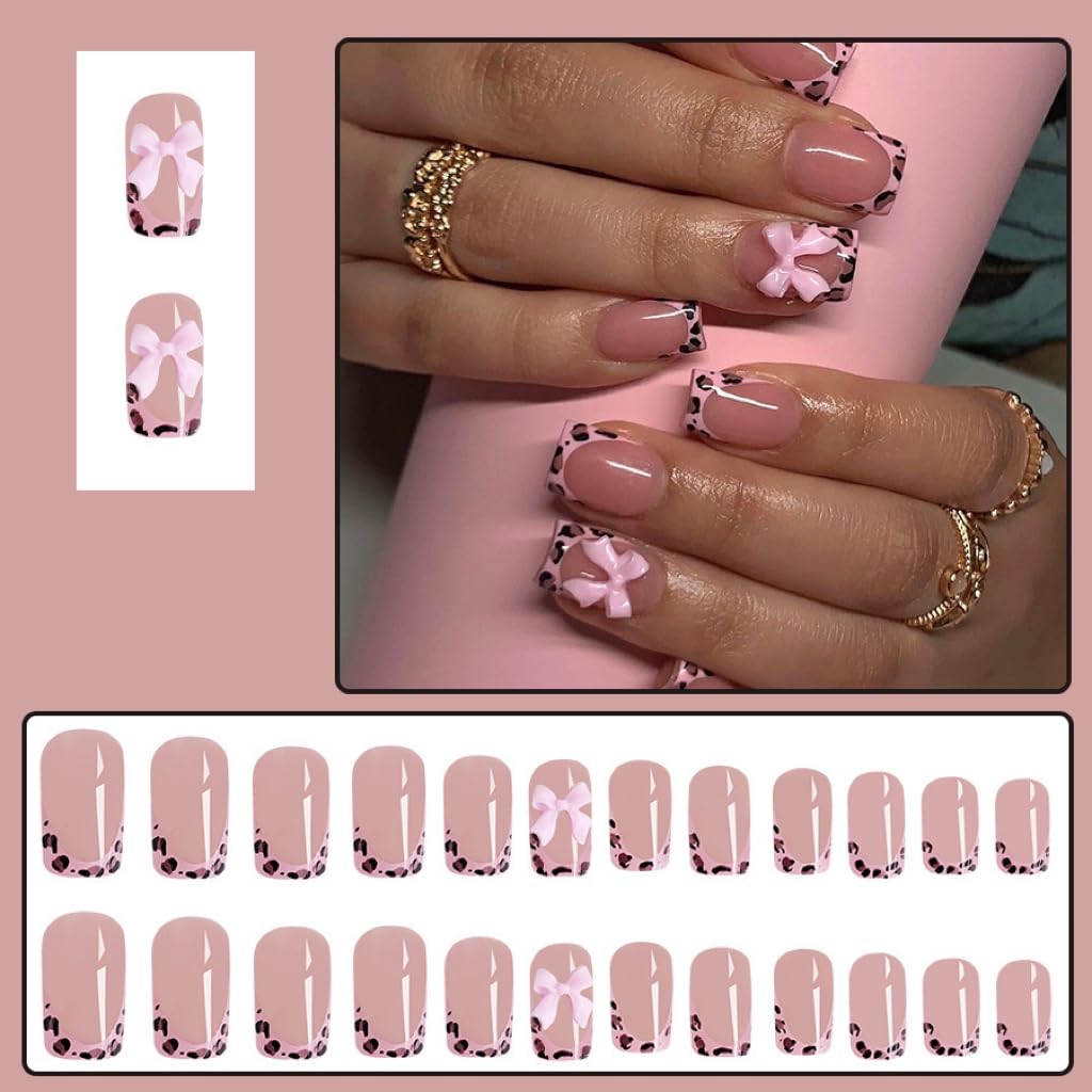 Close up of 3D pink bow detail on leopard print press on nails