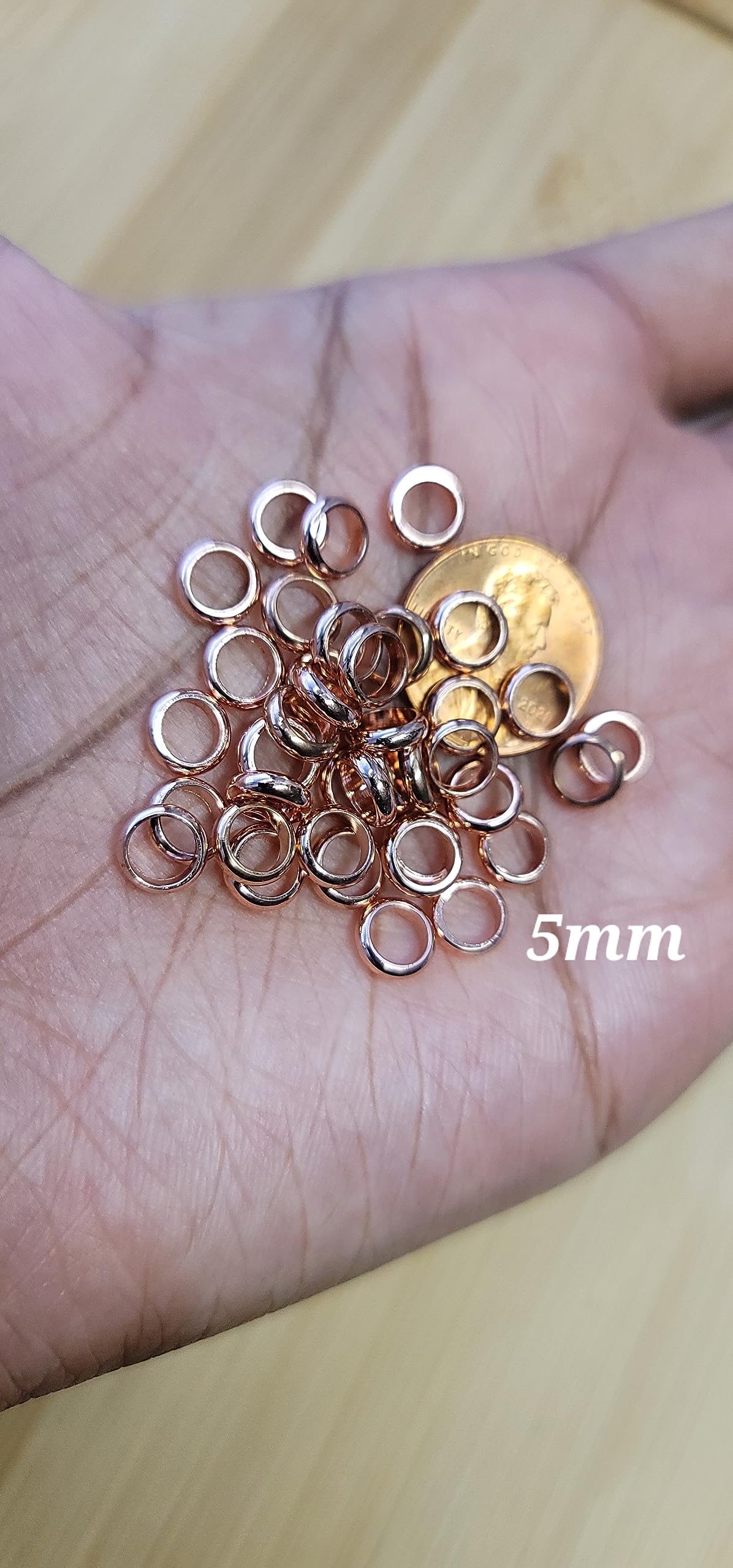Close up view of ten count copper loc jewelry rings for braids