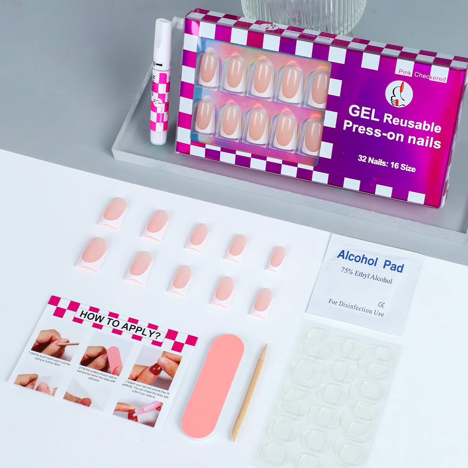 Top view of assorted sizes of Anyos French tip fake nails